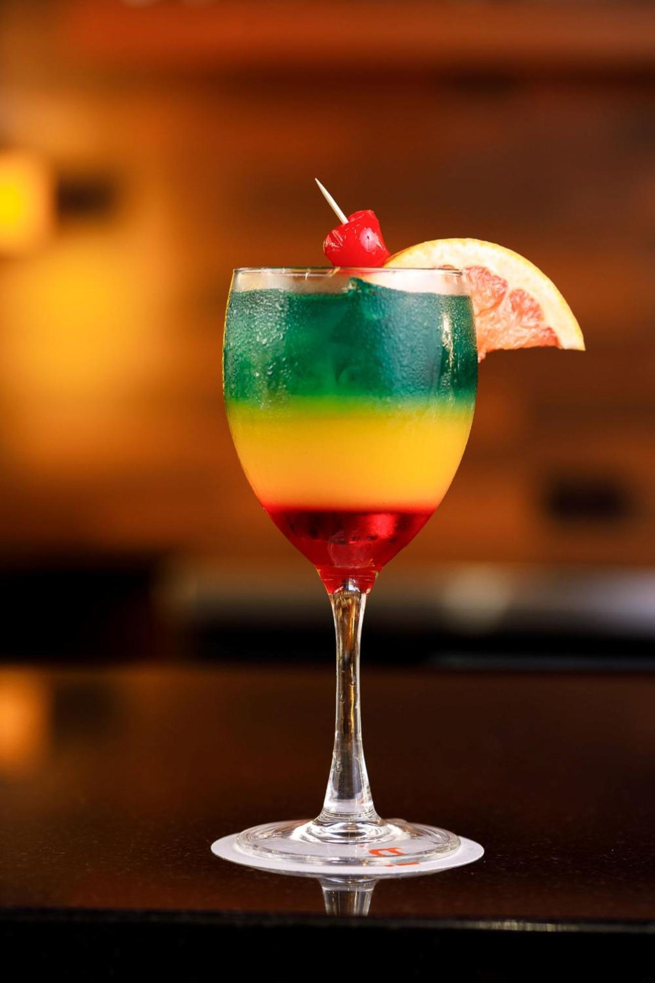 Real Inn Tijuana By Camino Real Hoteles Экстерьер фото A layered cocktail